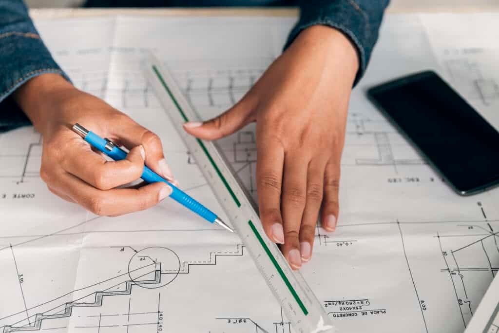 lady-working-with-ruler-pen